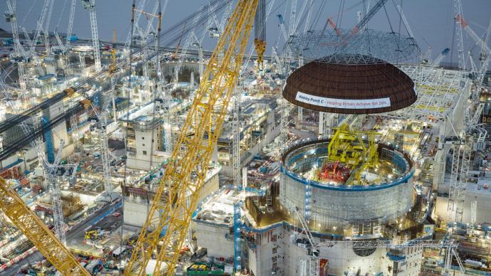 The Dome was safely lifted into its final position on top of the Unit 1 Reactor Building.